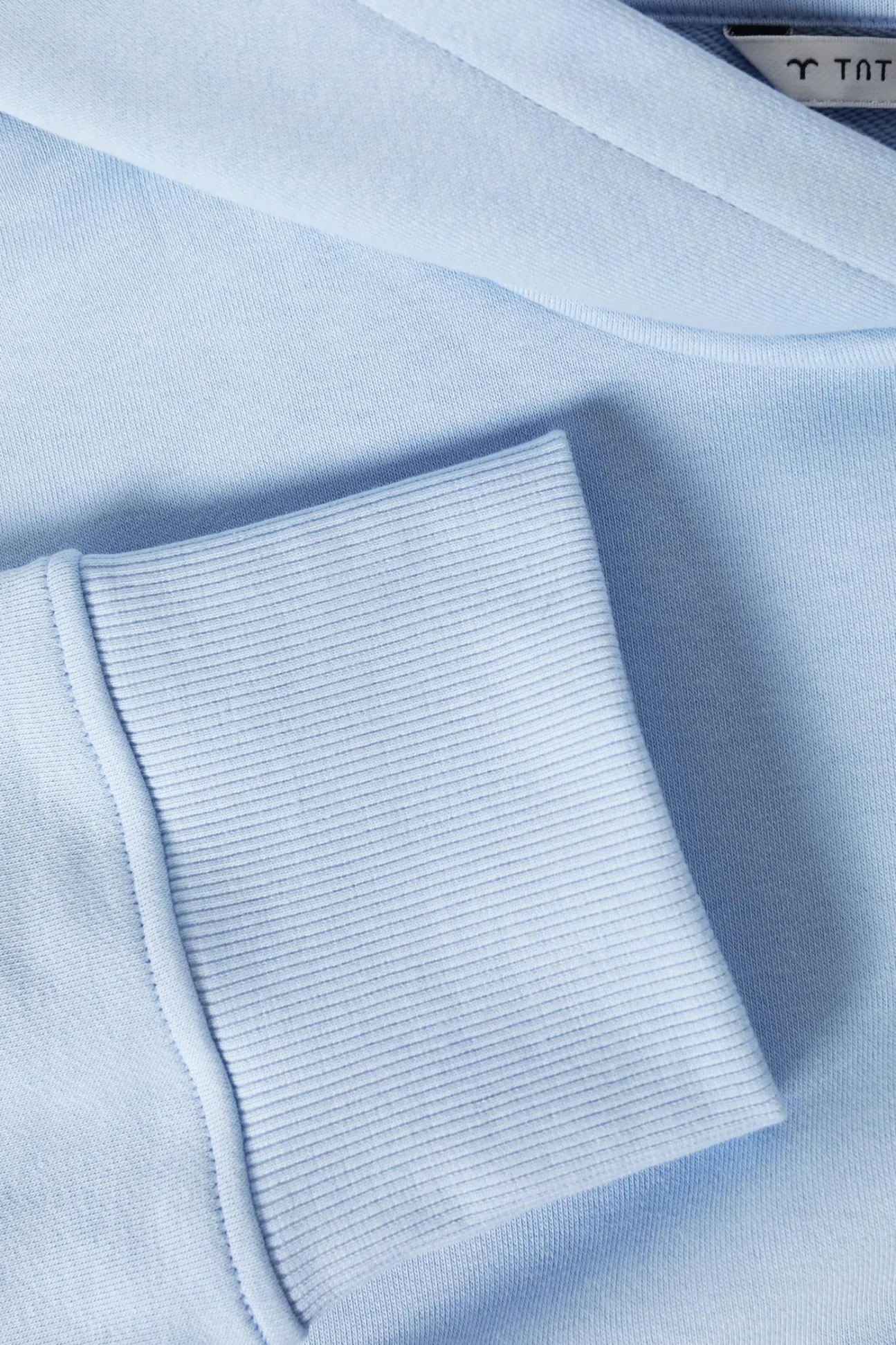 PASTELOWA BLUZA Z KAPTUREM — NULA