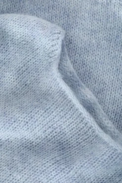 SWOBODNY SWETER DAMSKI Z DEKOLTEM W ŁÓDKĘ FLUFKO